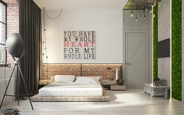 Un cabecero de cama de obra de estilo industrial con metal y ladrillo visto