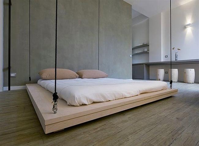 Una cama colgante de diseño minimalista