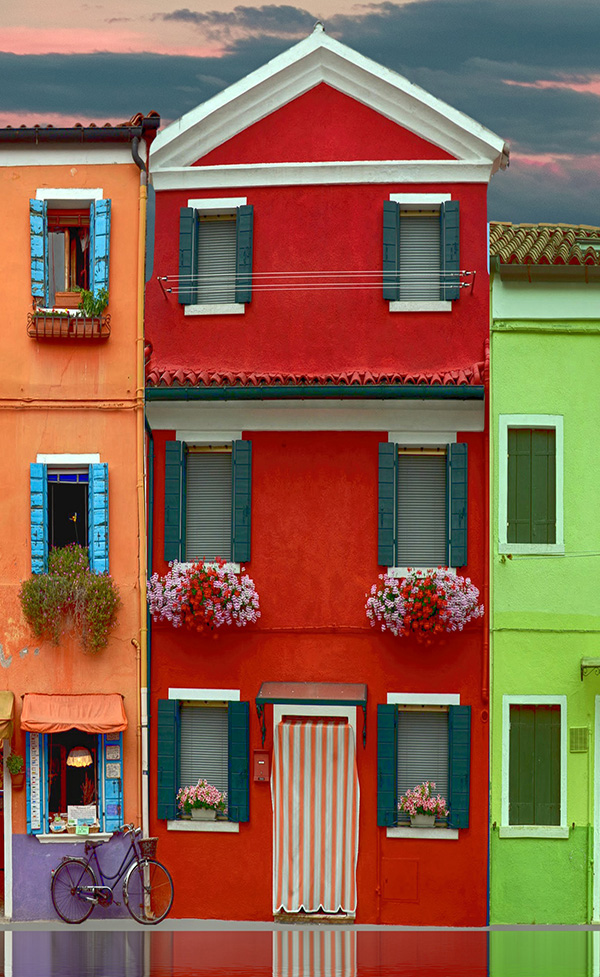 Frente de casa pintado de color rojo
