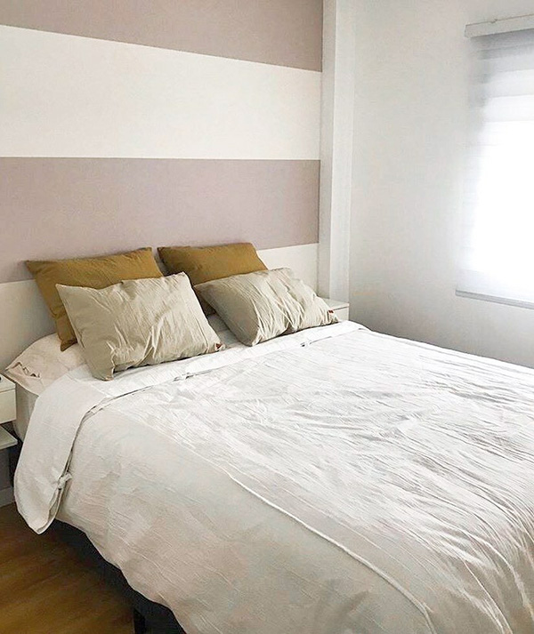 Un dormitorio pintado en tonos tierra, cálido y acogedor