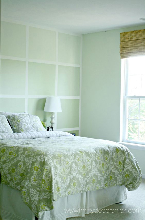 Un dormitorio pintado de verde